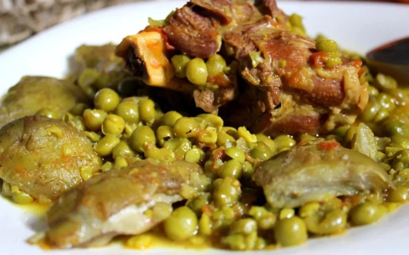 Tajine d'agneau aux fonds d'artichauts et petits pois