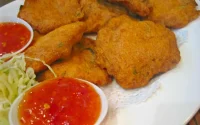 Beignets de poisson a la sauce tomate